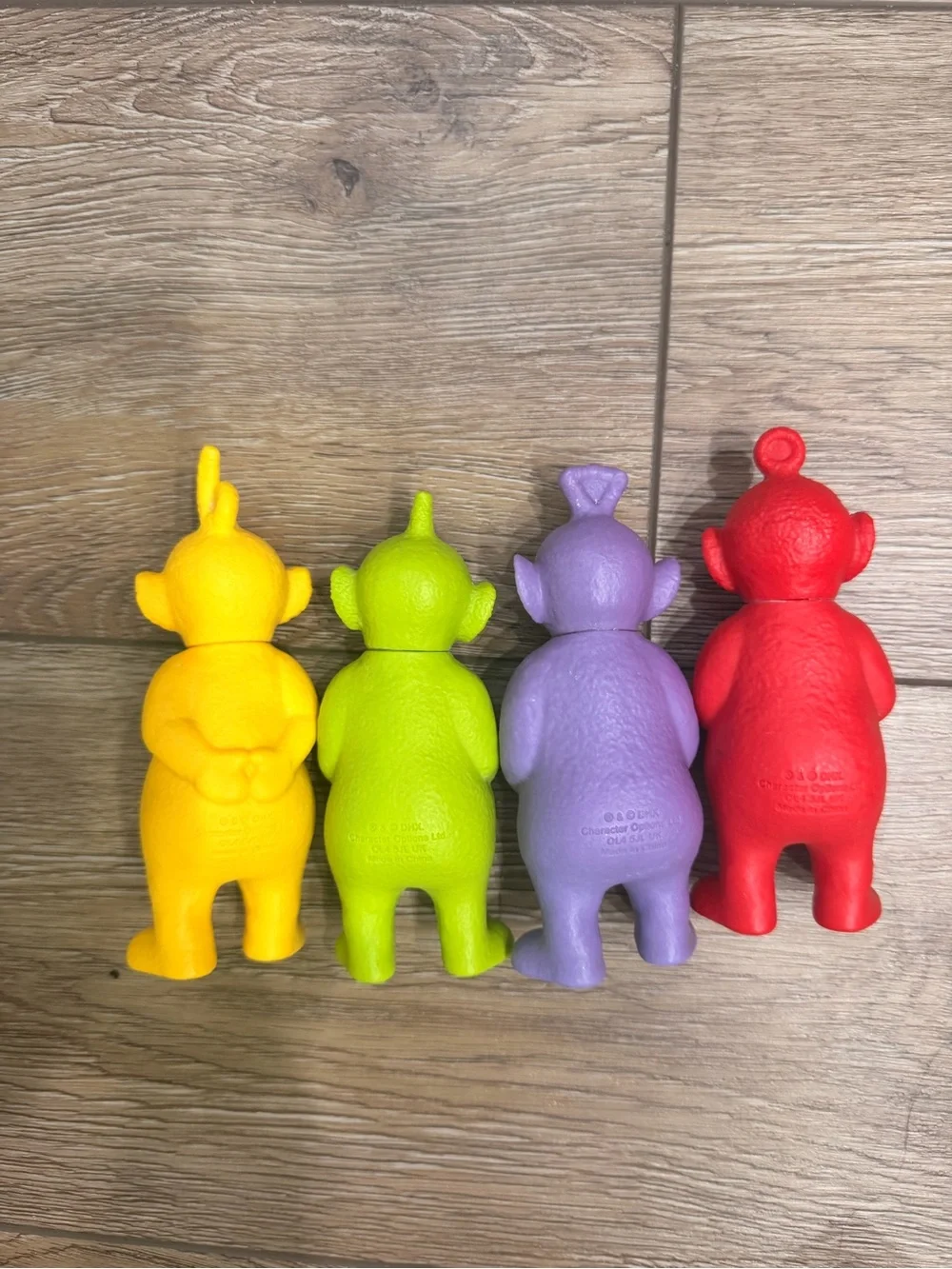 Set of Four Colorful Soft Vinyl Character Figures - Yellow, Green, Purple, Red